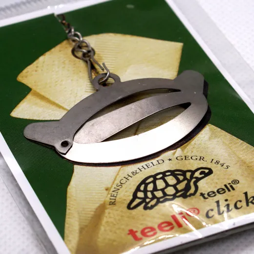 Teeli Click, Teebeutelhalter